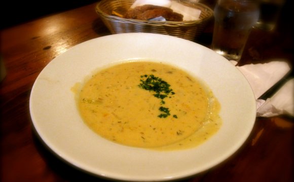 Sampling seafood chowder in