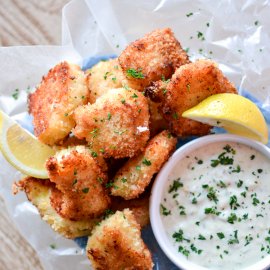 Recipe for Crispy Oven-Fried Fish Bites with Homemade Tartar Sauce is a quick weeknight meal that is kid friendly and so much better than the frozen stuff! | width=