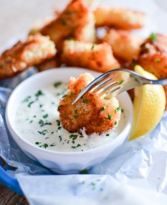 Recipe for Crispy Oven-Fried Fish Bites with Homemade Tartar Sauce is a quick weeknight meal that is kid friendly and so much better than the frozen stuff! | width=